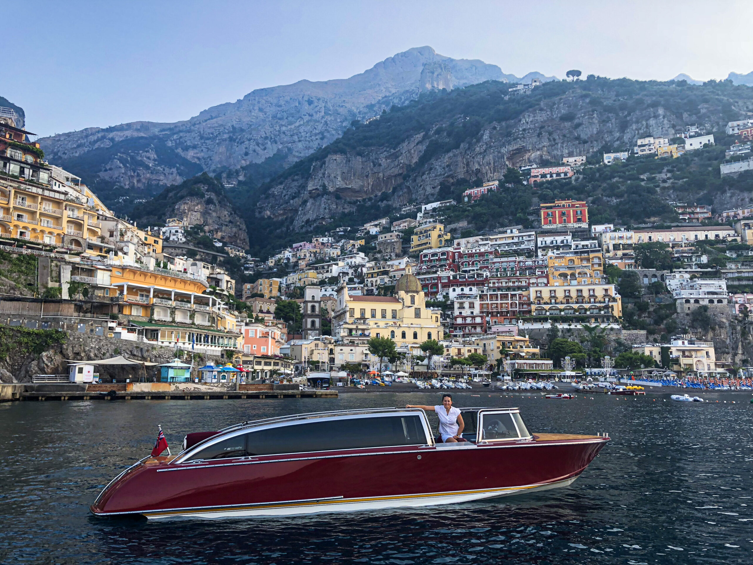 Positano from a tender driven by bosun